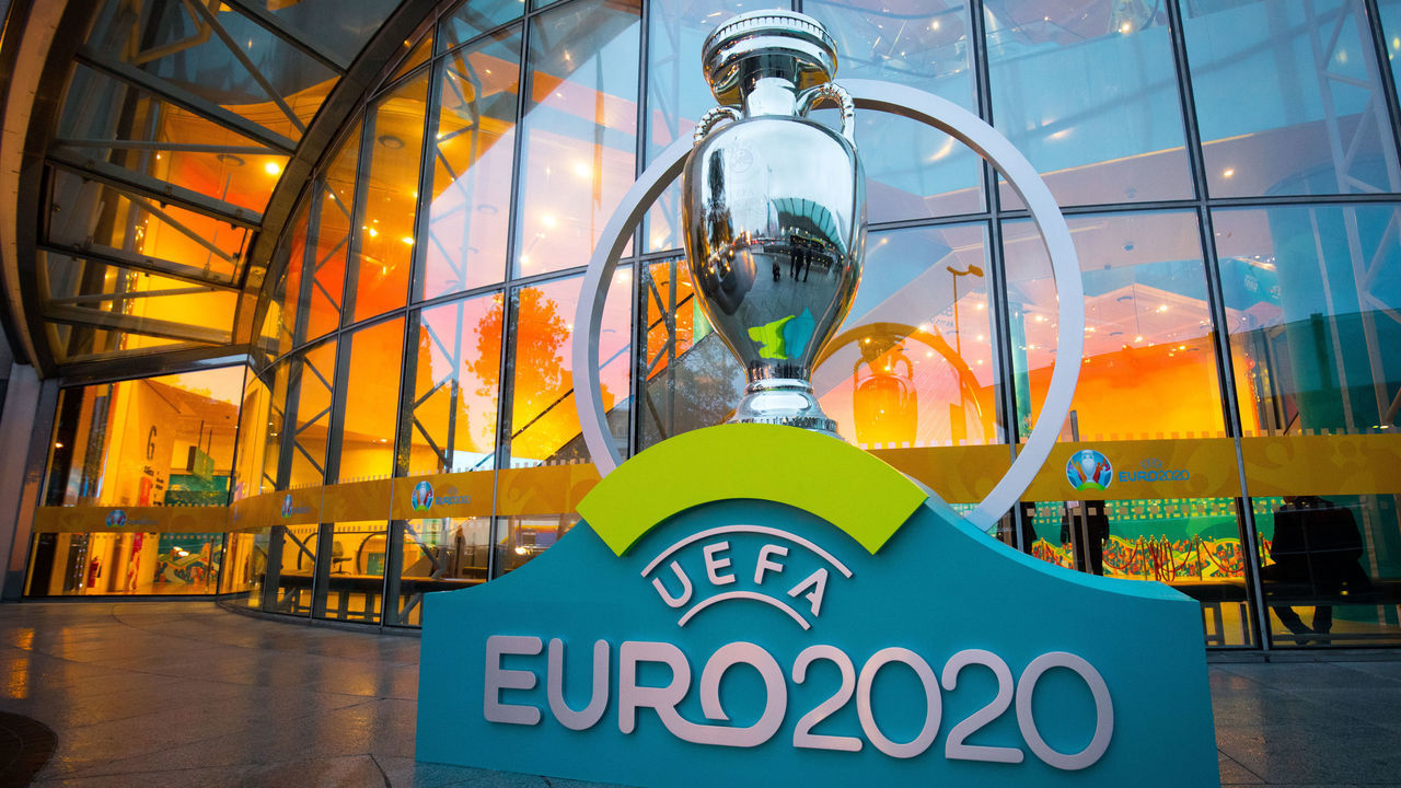 01 December 2018, Ireland, Dublin: Soccer: EM, UEFA, draw qualification groups for the EM 2020. An oversized trophy for the Euro 2020 is standing in front of the entrance to the Convention Center Dublin (CCD). The draw for the qualification groups for the EM 2020 will take place at the CCD on 02.12.2018. Photo: Christian Charisius/dpa