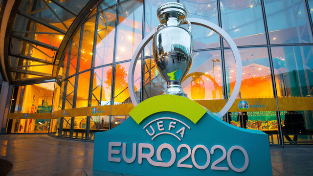 01 December 2018, Ireland, Dublin: Soccer: EM, UEFA, draw qualification groups for the EM 2020. An oversized trophy for the Euro 2020 is standing in front of the entrance to the Convention Center Dublin (CCD). The draw for the qualification groups for the EM 2020 will take place at the CCD on 02.12.2018. Photo: Christian Charisius/dpa