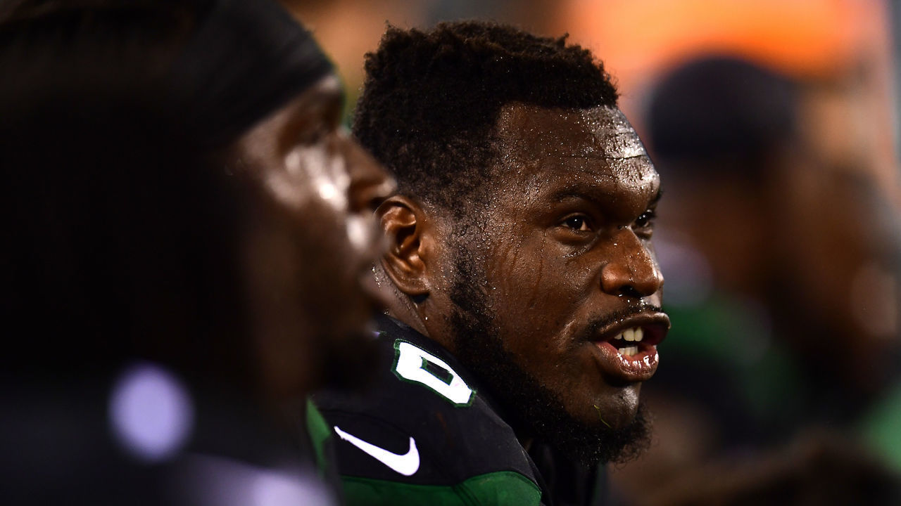 EAST RUTHERFORD, NEW JERSEY - SEPTEMBER 16: Kelechi Osemele #70 of the New York Jets sits on the sidelines during their game against the Cleveland Browns at MetLife Stadium on September 16, 2019 in East Rutherford, New Jersey.