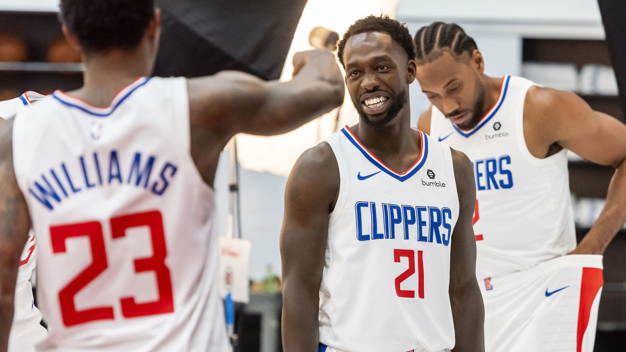 LOS ANGELES, CA - SEPTEMBER 29: Los Angeles Clippers, from, left, , Lou Williams (23), Patrick Beverley (21), and Kawhi Leonard (2) prepare for a photo shoot during the LA Clippers annual media day at the Honey Training Center in Los Angeles on Sunday, September 29, 2019.