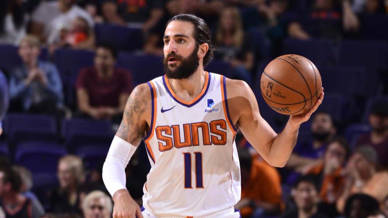 PHOENIX, AZ - OCTOBER 14: Ricky Rubio #11 of the Phoenix Suns handles the ball against the Denver Nuggets during a pre-season game on October 14, 2019 at Talking Stick Resort Arena. Mandatory Copyright Notice: Copyright 2019 NBAE