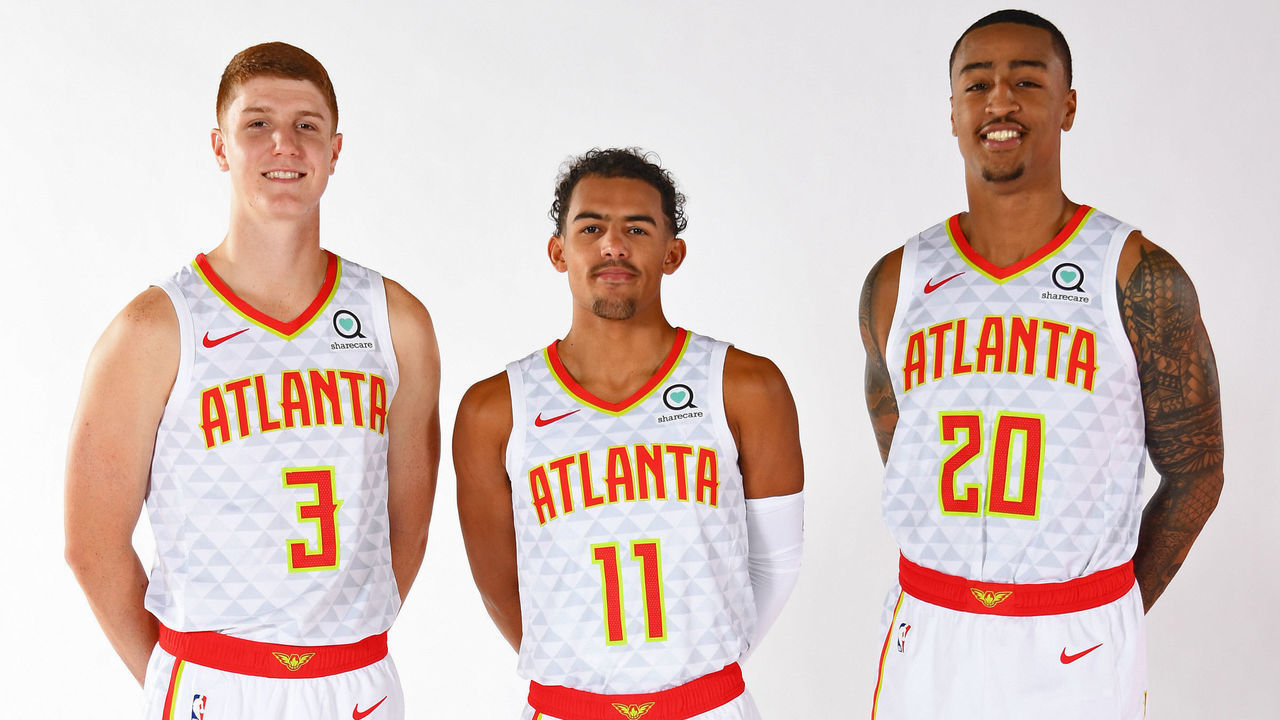 ATLANTA, GA - SEPTEMBER 30: Kevin Huerter #3, Trae Young #11 and John Collins #20 of the Atlanta Hawks pose for a portrait during media day on September 30, 2019 at the Emory Sports Medicine Complex in Atlanta, Georgia. NOTE TO USER: User expressly acknowledges and agrees that, by downloading and/or using this photograph, user is consenting to the terms and conditions of the Getty Images License Agreement. Mandatory Copyright Notice: Copyright 2019 NBAE