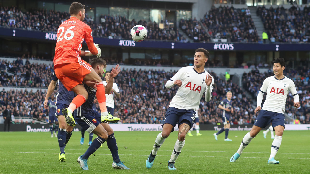 LONDON, ENGLAND - OCTOBER 19: Watford goalkeeper Ben Foster collides with Kiko Femenia of Watford and Dele Alli of Tottenham is free to move onto the ball and score the equalising goal during the Premier League match between Tottenham Hotspur and Watford FC at Tottenham Hotspur Stadium on October 19, 2019 in London, United Kingdom.
