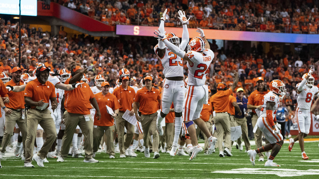SYRACUSE, NY - SEPTEMBER 14: Clemson Tigers Cornerback Andrew Booth Jr. (23) and Clemson Tigers Safety Nolan Turner (24) celebrate making a defensive stop against the Syracuse Orange during the second half of the game between the Clemson Tigers and the Syracuse Orange on September 14, 2019, at the Carrier Dome in Syracuse, NY.