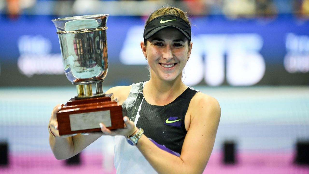 Switzerland's Belinda Bencic holds her trophy as she celebrates after winning the Kremlin Cup tennis tournament Women's single final match against Russia's Anastasia Pavlyuchenkova, in Moscow, on October 20, 2019.