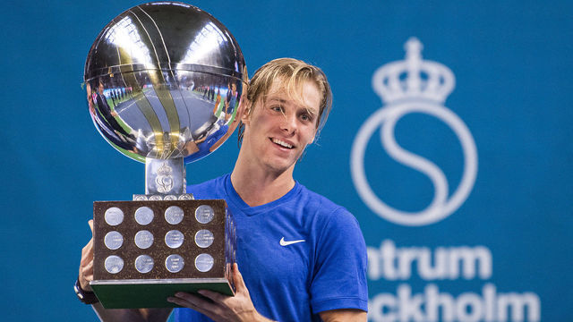 Canadas Denis Shapovalov poses with his trophy after winning the ATP Stockholm Open tennis tournament following his victory against Serbias Filip Kranjinovic (R) on October 20, 2019 in Stockholm.