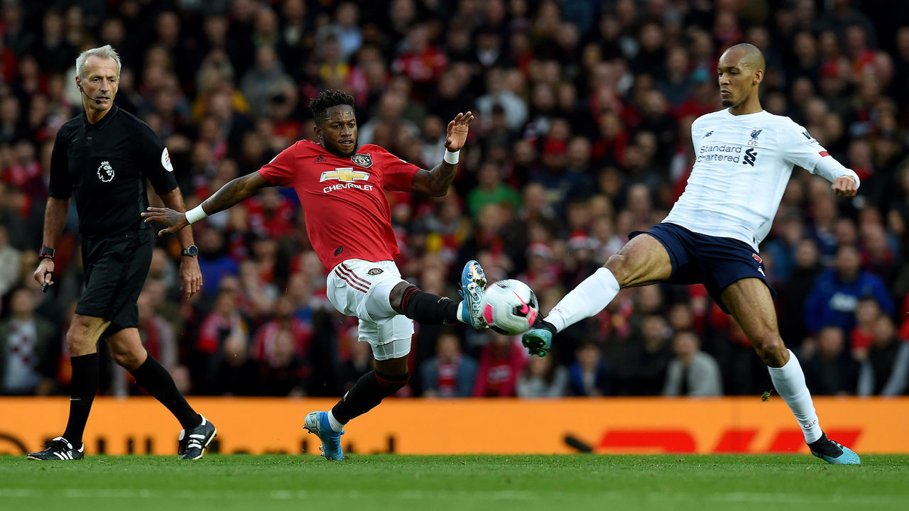 MANCHESTER, ENGLAND - OCTOBER 20: (THE SUN OUT, THE SUN ON SUNDAY OUT) Fabinho of Liverpool with Fred of Manchester United during the Premier League match between Manchester United and Liverpool FC at Old Trafford on October 20, 2019 in Manchester, United Kingdom.