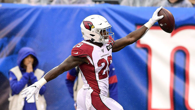 EAST RUTHERFORD, NEW JERSEY - OCTOBER 20: Chase Edmonds #29 of the Arizona Cardinals runs the ball for a touchdown against the New York Giants during the first half at MetLife Stadium on October 20, 2019 in East Rutherford, New Jersey.