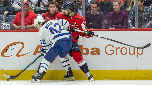 WASHINGTON, DC - OCTOBER 16: Toronto Maple Leafs center Trevor Moore (42) checks Washington Capitals defenseman Jonas Siegenthaler (34) during a NHL game between the Washington Capitals and the Toronto Maple Leafs on October 16, 2019, at Capital One Arena, in Washington D.C.