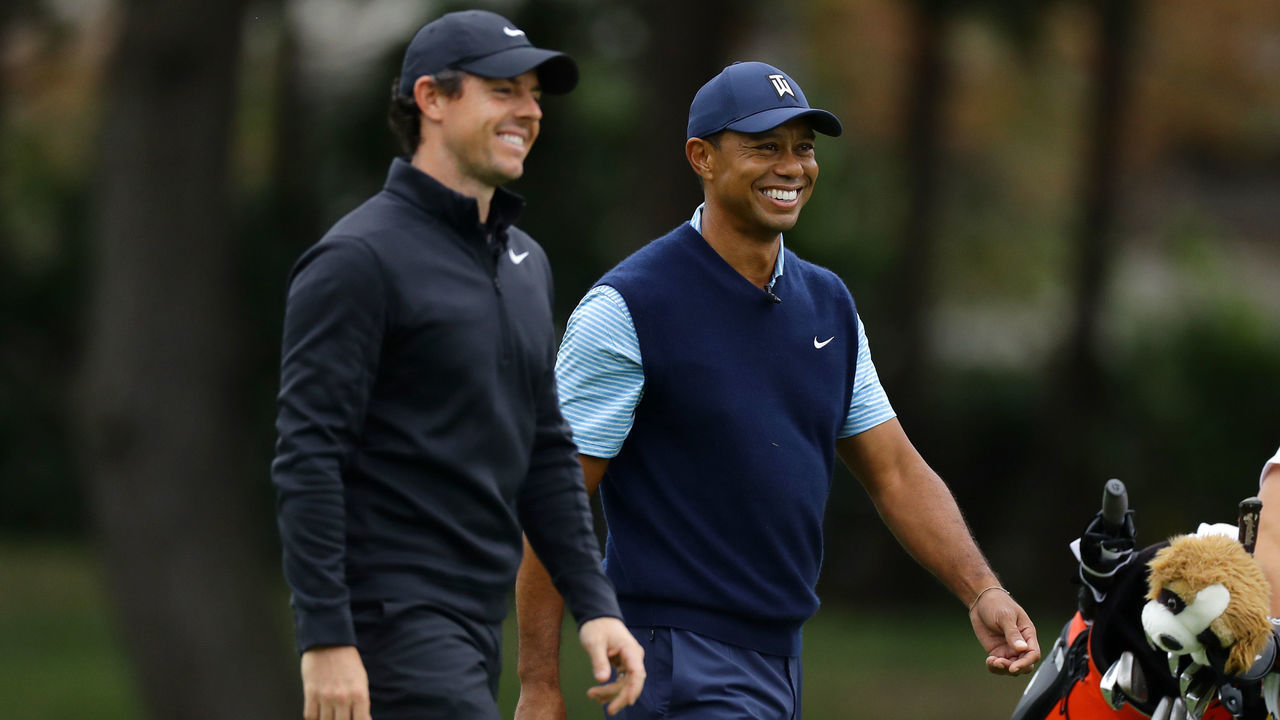 INZAI, JAPAN - OCTOBER 21: Tiger Woods of the United States and Rory McIlroy of Northern Ireland shares a laugh on the 4th hole during The Challenge: Japan Skins at Accordia Golf Narashino Country Club on October 21, 2019 in Inzai, Chiba, Japan.