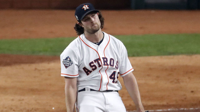 HOUSTON, TEXAS - OCTOBER 22: Gerrit Cole #45 of the Houston Astros reacts after allowing a two-RBI double to Juan Soto (not pictured) of the Washington Nationals during the fifth inning in Game One of the 2019 World Series at Minute Maid Park on October 22, 2019 in Houston, Texas.