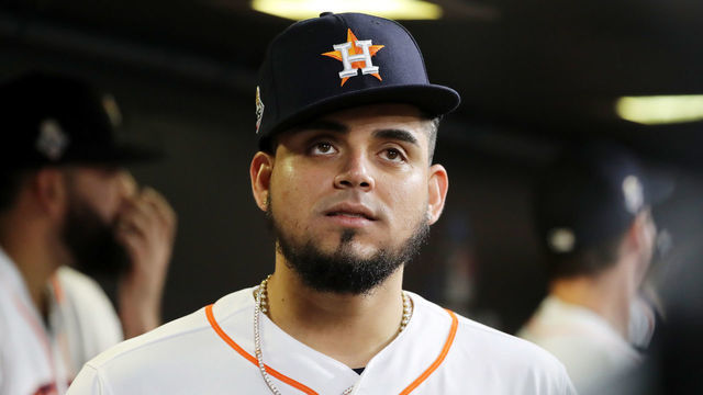 HOUSTON, TEXAS - OCTOBER 22: Roberto Osuna #54 of the Houston Astros looks on from the dugout prior to Game One of the 2019 World Series against the Washington Nationals at Minute Maid Park on October 22, 2019 in Houston, Texas.