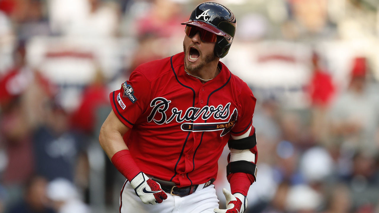 ATLANTA, GEORGIA - OCTOBER 04: Josh Donaldson #20 of the Atlanta Braves reacts after an RBI single off Jack Flaherty #22 of the St. Louis Cardinals in the first inning in game two of the National League Division Series at SunTrust Park on October 04, 2019 in Atlanta, Georgia.