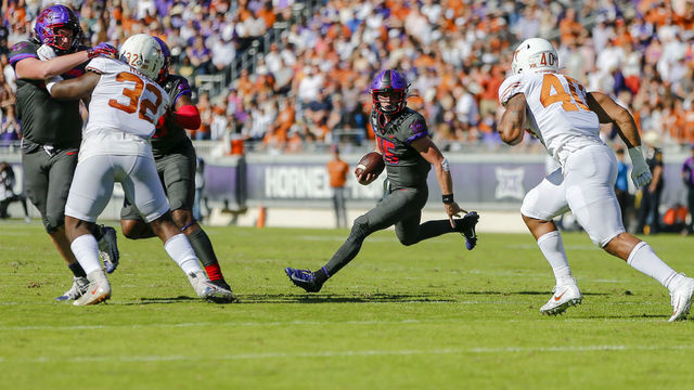 FORT WORTH, TX - OCTOBER 26: TCU Horned Frogs quarterback Max Duggan (15) tries to run through the TCU Horned Frogs defense during the game between the TCU Horned Frogs and the Texas Longhorns on October 26, 2019 at Amon G. Carter Stadium in Fort Worth, Texas.
