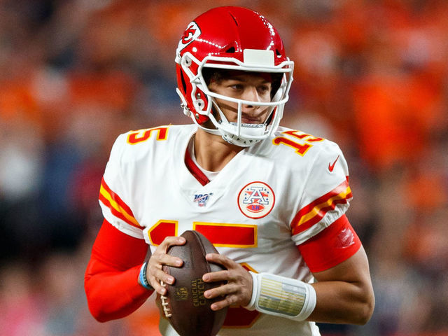 DENVER, CO - OCTOBER 17: Quarterback Patrick Mahomes #15 of the Kansas City Chiefs looks to pass against the Denver Broncos during the first quarter at Empower Field at Mile High on October 17, 2019 in Denver, Colorado.