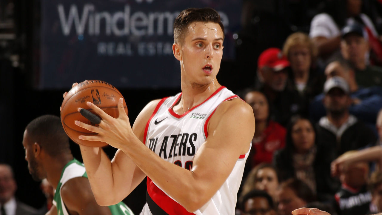 PORTLAND, OR - OCTOBER 10: Zach Collins #33 of the Portland Trail Blazers handles the ball during a pre-season game against the Maccabi Haifa on October 10, 2019 at the Moda Center Arena in Portland, Oregon. Mandatory Copyright Notice: Copyright 2019 NBAE