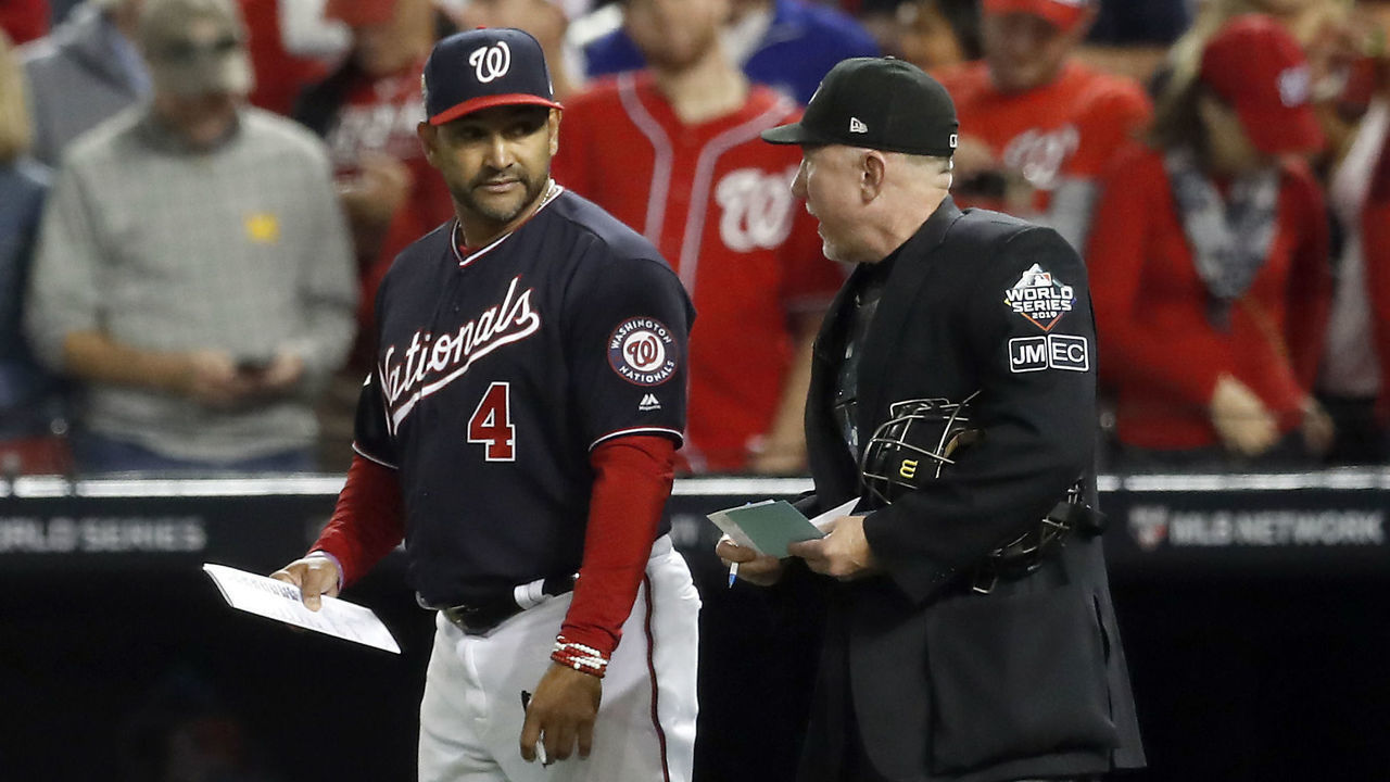 WASHINGTON, DC - OCTOBER 27: Manager Dave Martinez #4 of the Washington Nationals disputes a called strike with home plate umpire Lance Barksdale #23 in the seventh inning of Game 5 of the 2019 World Series between the Houston Astros and the Washington Nationals at Nationals Park on Sunday, October 27, 2019 in Washington, District of Columbia.