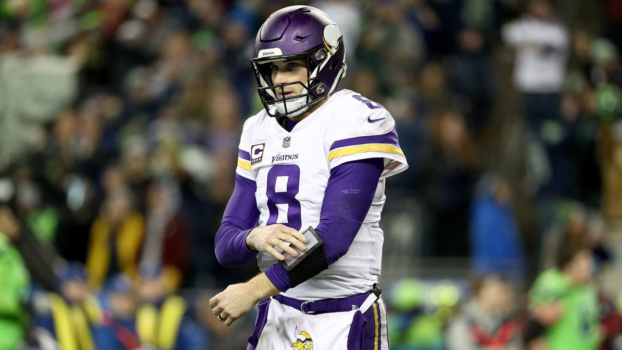 SEATTLE, WA - DECEMBER 10: Kirk Cousins #8 of the Minnesota Vikings reacts after fumbling the ball in the fourth quarter to result in a Seattle Seahawk touchdown during their game at CenturyLink Field on December 10, 2018 in Seattle, Washington.