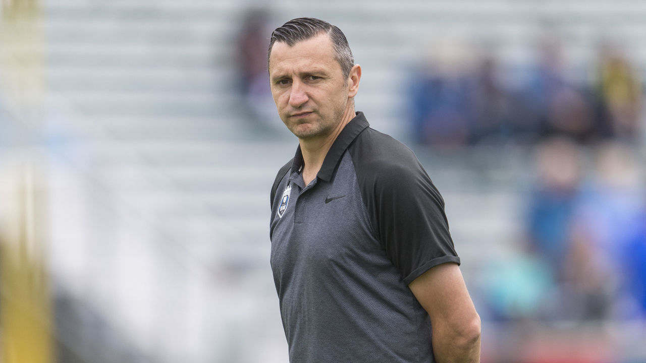 CARY, NC - OCTOBER 20: Vlatko Andonovski of the Reign FC watches his team prior to a game between Reign FC and North Carolina Courage at Sahlen's Stadium at WakeMed Soccer Park on October 20, 2019 in Cary, North Carolina. .