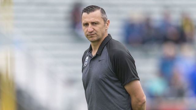 CARY, NC - OCTOBER 20: Vlatko Andonovski of the Reign FC watches his team prior to a game between Reign FC and North Carolina Courage at Sahlen's Stadium at WakeMed Soccer Park on October 20, 2019 in Cary, North Carolina. .