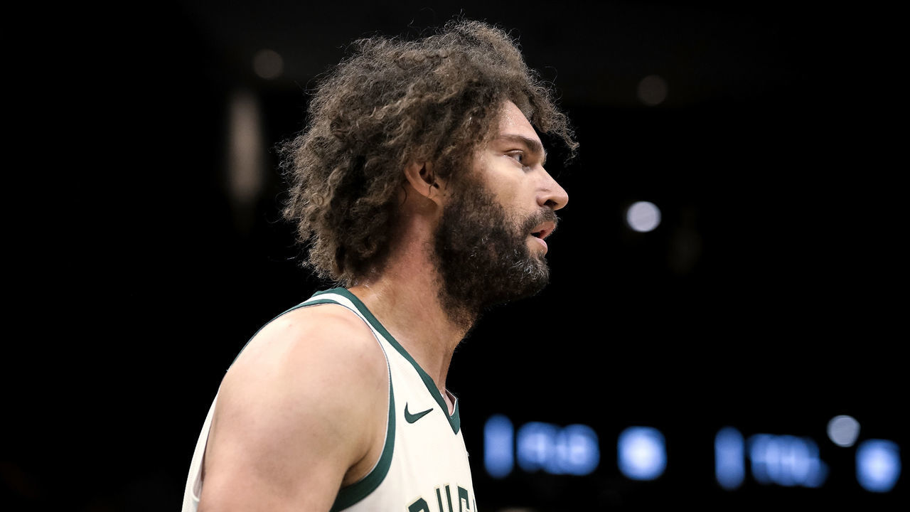 MILWAUKEE, WISCONSIN - OCTOBER 09: Robin Lopez #42 of the Milwaukee Bucks walks across the court in the first quarter against the Utah Jazz during a preseason game at Fiserv Forum on October 09, 2019 in Milwaukee, Wisconsin.