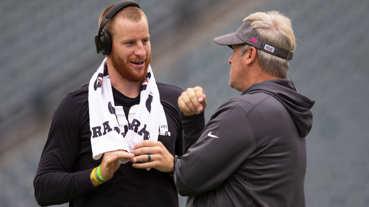 PHILADELPHIA, PA - OCTOBER 06: Carson Wentz #11 of the Philadelphia Eagles talks to head coach Doug Pederson prior to the game against the New York Jets at Lincoln Financial Field on October 6, 2019 in Philadelphia, Pennsylvania.