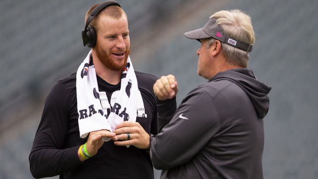 PHILADELPHIA, PA - OCTOBER 06: Carson Wentz #11 of the Philadelphia Eagles talks to head coach Doug Pederson prior to the game against the New York Jets at Lincoln Financial Field on October 6, 2019 in Philadelphia, Pennsylvania.