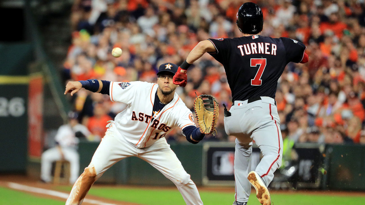 HOUSTON, TEXAS - OCTOBER 29: Trea Turner #7 of the Washington Nationals is called out on runner interference for colliding with Yuli Gurriel #10 of the Houston Astros during the seventh inning in Game Six of the 2019 World Series at Minute Maid Park on October 29, 2019 in Houston, Texas.