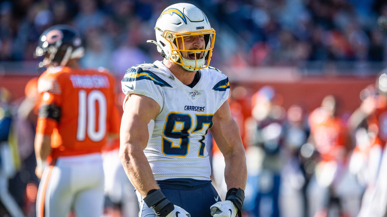 CHICAGO, IL - OCTOBER 27: Los Angeles Chargers Defensive End Joey Bosa (97) celebrates after the Chargers recover a Chicago Bears Quarterback Mitchell Trubisky (10) fumble in the 4th quarter during an NFL football game between the Los Angeles Chargers and the Chicago Bears on October 27, 2019, at Soldier Field in Chicago, IL. The Chargers won 17-16.