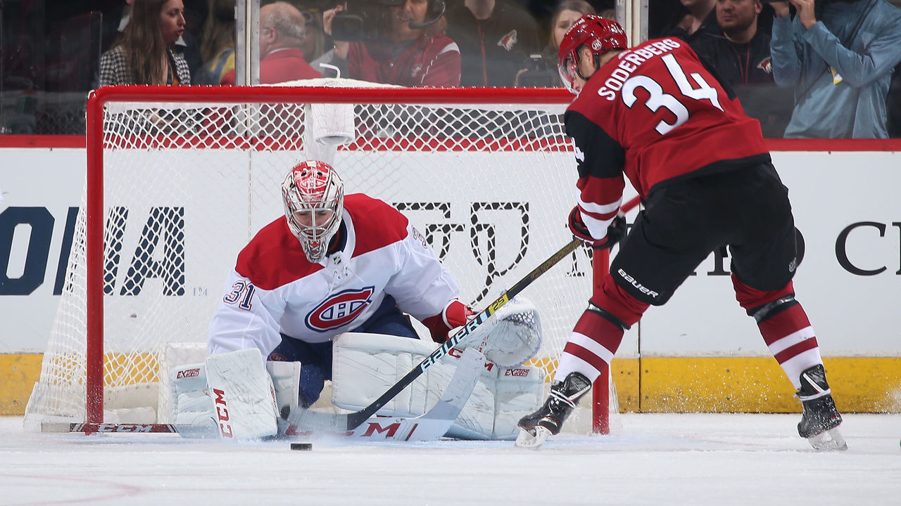 GLENDALE, ARIZONA - OCTOBER 30: Goaltender Carey Price #31 of the Montreal Canadiens makes a save on Carl Soderberg #34 of the Arizona Coyotes during the first period of the NHL game at Gila River Arena on October 30, 2019 in Glendale, Arizona.