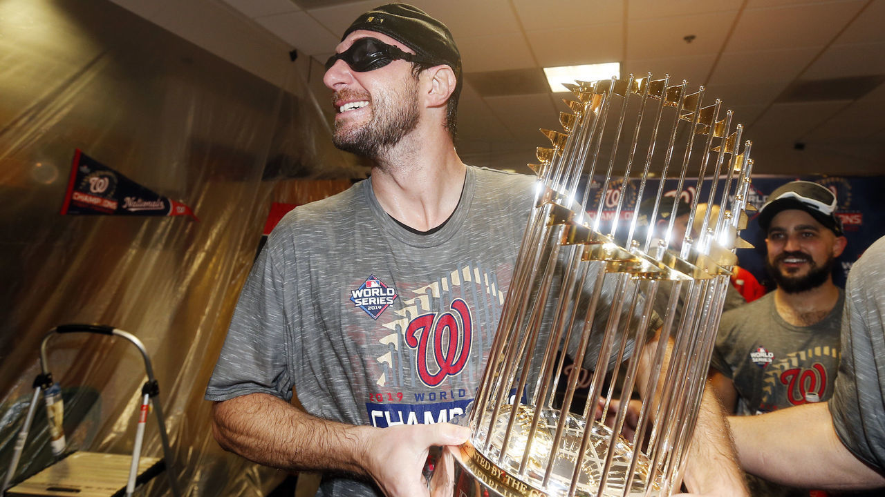 HOUSTON, TEXAS - OCTOBER 30: Max Scherzer #31 of the Washington Nationals celebrates in the locker room after defeating the Houston Astros in Game Seven to win the 2019 World Series at Minute Maid Park on October 30, 2019 in Houston, Texas. The Washington Nationals defeated the Houston Astros with a score of 6 to 2.