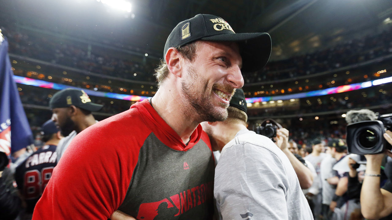 National League's Max Scherzer, of the Washington Nationals, arrives with  his wife Erica and daughters Brooklyn and Kacey at the All Star Red Carpet  event prior to the MLB All-Star baseball game