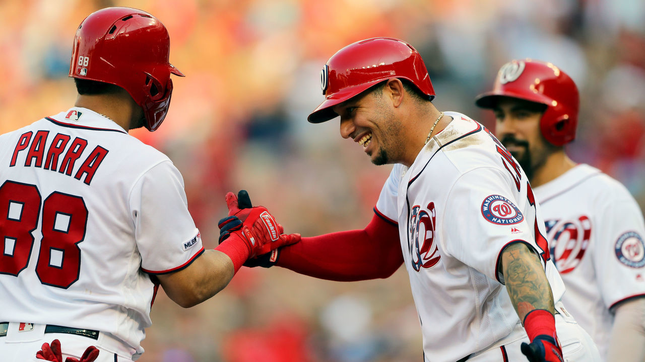 WASHINGTON, DC - SEPTEMBER 28: Asdrubal Cabrera #13 celebrates the grand slam hit by Gerardo Parra #88 of Washington Nationals against the Cleveland Indians at Nationals Park on Saturday, September 28, 2019 in Washington, District of Columbia.