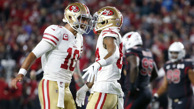 GLENDALE, ARIZONA - OCTOBER 31: Quarterback Jimmy Garoppolo #10 of the San Francisco 49ers celebrates with receiver Kendrick Bourne #84 after Bourne's touchdown catch against the Arizona Cardinals during the first half of the NFL football game at State Farm Stadium on October 31, 2019 in Glendale, Arizona.