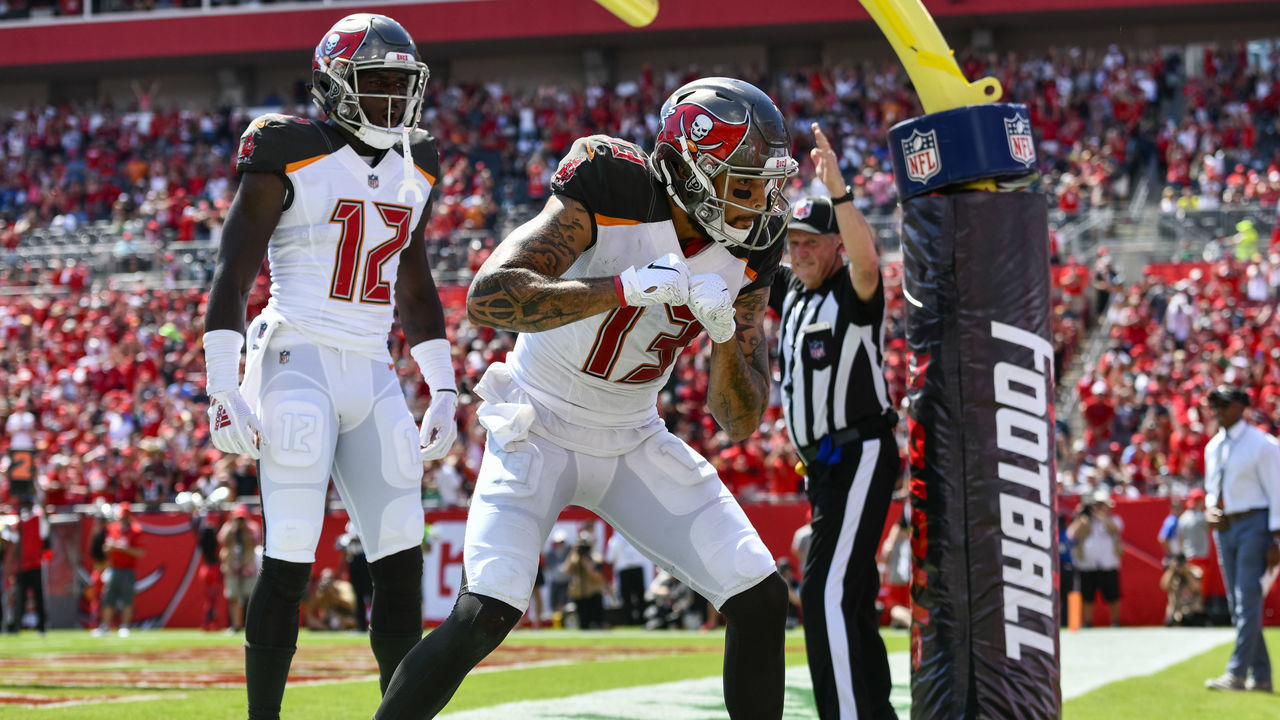TAMPA, FL - SEPTEMBER 16: Tampa Bay Buccaneers wide receiver Mike Evans (13) celebrates his touchdown catch as Tampa Bay Buccaneers wide receiver Chris Godwin (12) looks on during the second half of an NFL game between the Philadelphia Eagles and the Tampa Bay Buccaneers on September 16, 2018, at Raymond James Stadium in Tampa, FL. The Bucs defeated the Eagles 27-21.