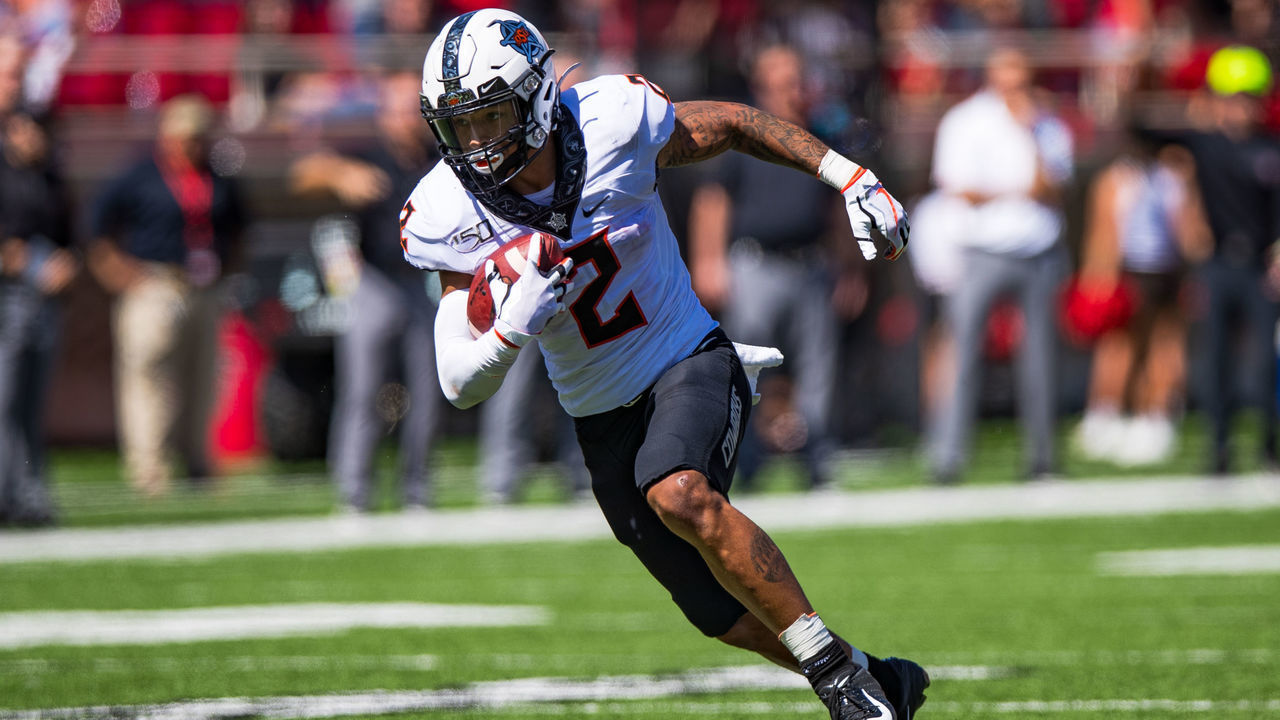 LUBBOCK, TEXAS - OCTOBER 05: Wide receiver Tylan Wallace #2 of the Oklahoma State Cowboys runs down the field during the second half of the college football game against the Texas Tech Red Raiders on October 05, 2019 at Jones AT&T Stadium in Lubbock, Texas.