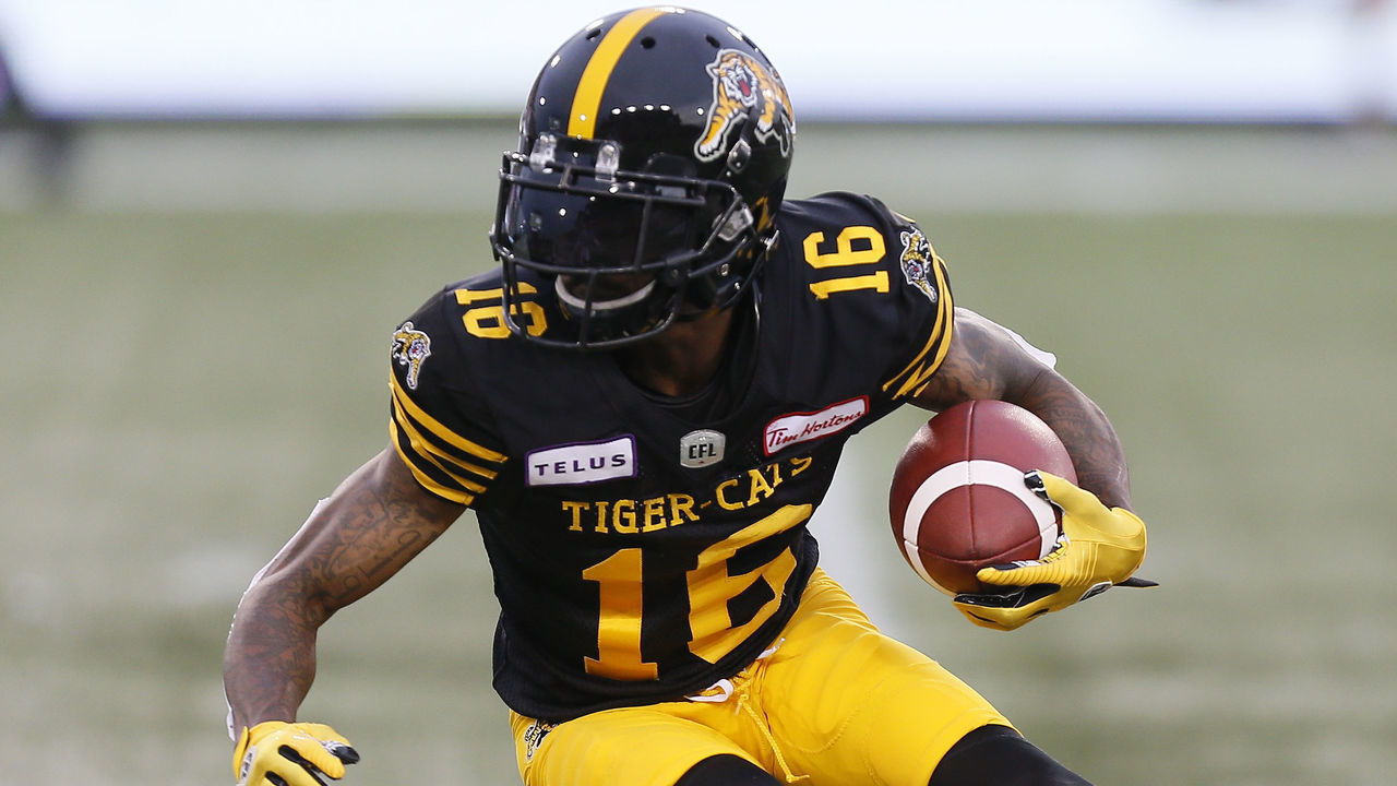 HAMILTON, ON - JUNE 28: Brandon Banks #16 of the Hamilton Tiger-Cats carries the ball againt the Montreal Alouettesat Tim Hortons Field on June 28, 2019 in Hamilton, Canada. Hamilton defeated Montreal 41-10.