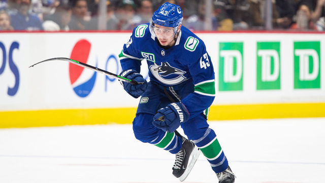 VANCOUVER, BC - OCTOBER 28: Vancouver Canucks Defenseman Quinn Hughes (43) skates up ice during their NHL game against the Florida Panthers at Rogers Arena on October 28, 2019 in Vancouver, British Columbia, Canada.