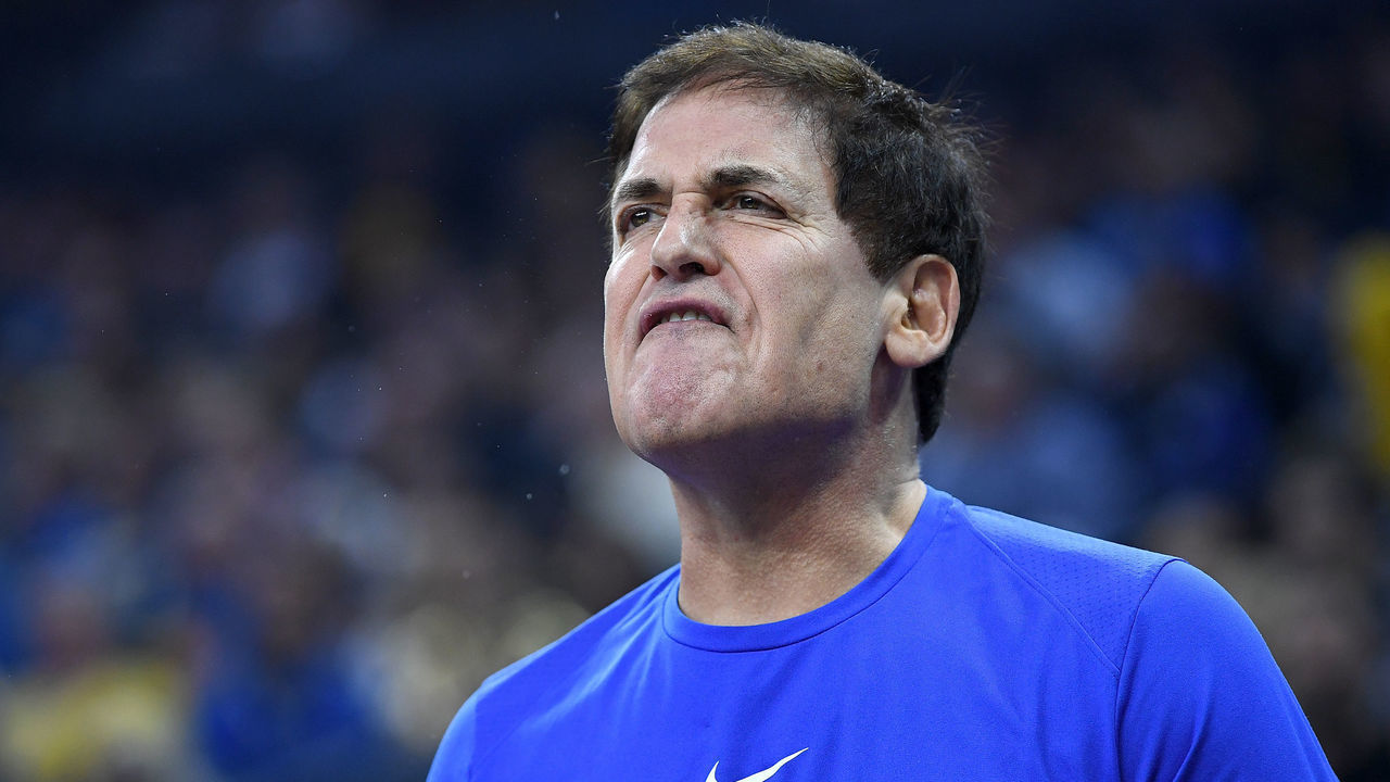 OAKLAND, CA - DECEMBER 22: Team owner Mark Cuban of the Dallas Mavericks from behind the team bench reacts to the officiating against the Golden State Warriors during an NBA basketball game at ORACLE Arena on December 22, 2018 in Oakland, California.