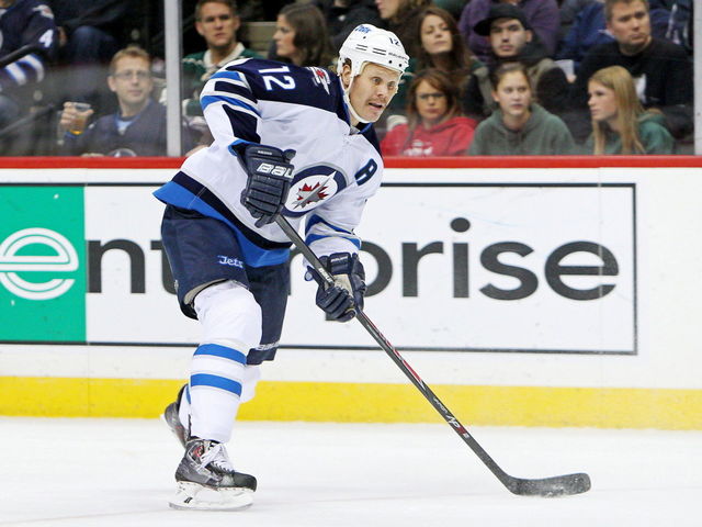 GIF: Olli Jokinen dekes Tim Thomas out of the game