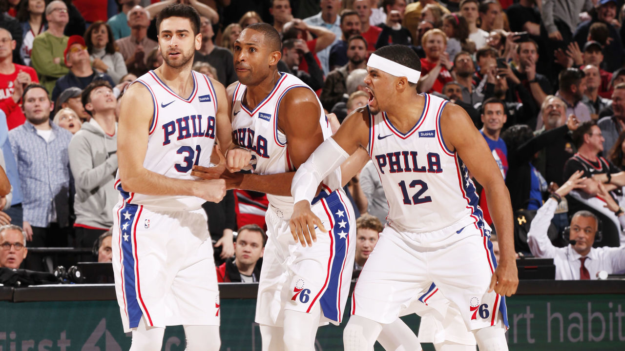 PORTLAND, OR - NOVEMBER 2: Furkan Korkmaz #30, Al Horford #42 and Tobias Harris #12 of the Philadelphia 76ers react during a game against the Portland Trail Blazers on November 2, 2019 at the Moda Center Arena in Portland, Oregon. Mandatory Copyright Notice: Copyright 2019 NBAE