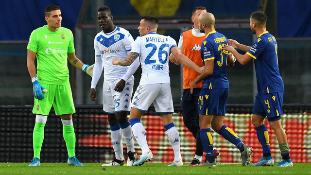 VERONA, ITALY - NOVEMBER 03: Mario Balotelli #45 of Brescia Calcio reacts to racist chants from Verona fans during the Serie A match between Hellas Verona and Brescia Calcio at Stadio Marcantonio Bentegodi on November 3, 2019 in Verona, Italy.
