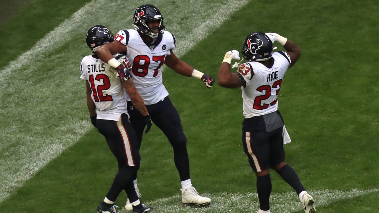 Houston Texans' Darren Fells (centre) celebrates scoring his sides first touchdown during the NFL International Series match at Wembley Stadium, London.