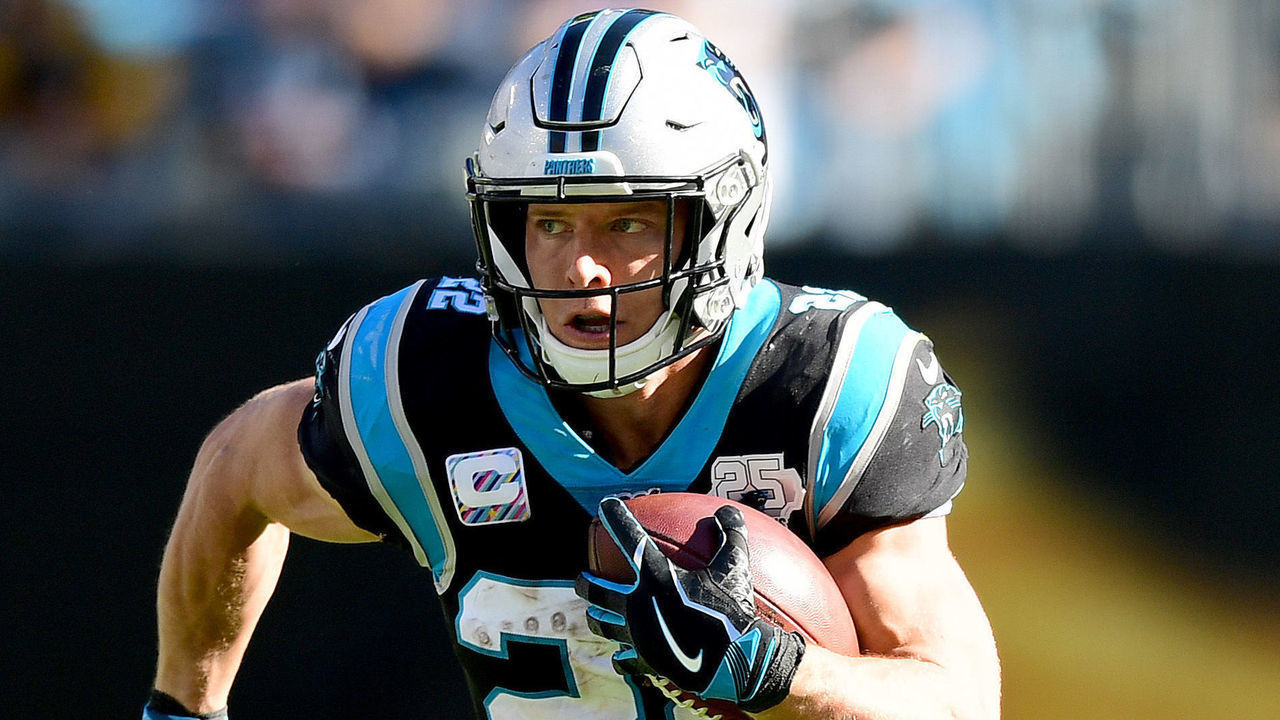CHARLOTTE, NORTH CAROLINA - NOVEMBER 03: Christian McCaffrey #22 of the Carolina Panthers runs with the ball in the second quarter during their game against the Tennessee Titans at Bank of America Stadium on November 03, 2019 in Charlotte, North Carolina.