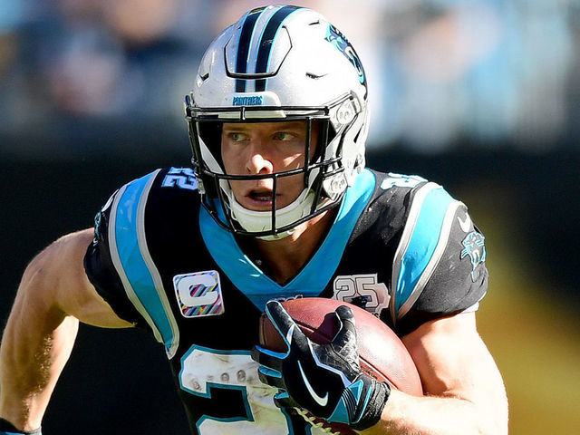 CHARLOTTE, NORTH CAROLINA - NOVEMBER 03: Christian McCaffrey #22 of the Carolina Panthers runs with the ball in the second quarter during their game against the Tennessee Titans at Bank of America Stadium on November 03, 2019 in Charlotte, North Carolina.