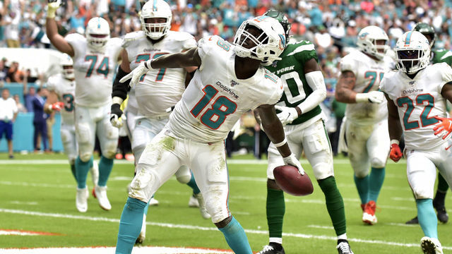 MIAMI, FL - NOVEMBER 03: Preston Williams #18 of the Miami Dolphins celebrates after scoring a touchdown in the second quarter against the New York Jets at Hard Rock Stadium on November 3, 2019 in Miami, Florida.
