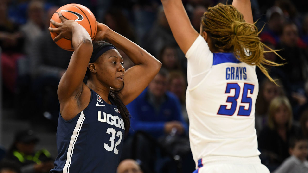CHICAGO, IL - DECEMBER 08: Connecticut Huskies forward Batouly Camara (32) controls the ball during a game between the Connecticut Huskies and the DePaul Blue Demons on December 8, 2017, at the Wintrust Arena in Chicago, IL. Connecticut won 101-69.