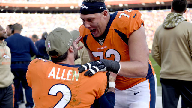 DENVER, CO - NOVEMBER 3: Denver Broncos offensive tackle Garett Bolles #72 celebrates a touchdown pass with Denver Broncos quarterback Brandon Allen #2 the Denver Broncos take one the Cleveland Browns at Empower Field at Mile High in Denver, Colorado on November 3, 2019.