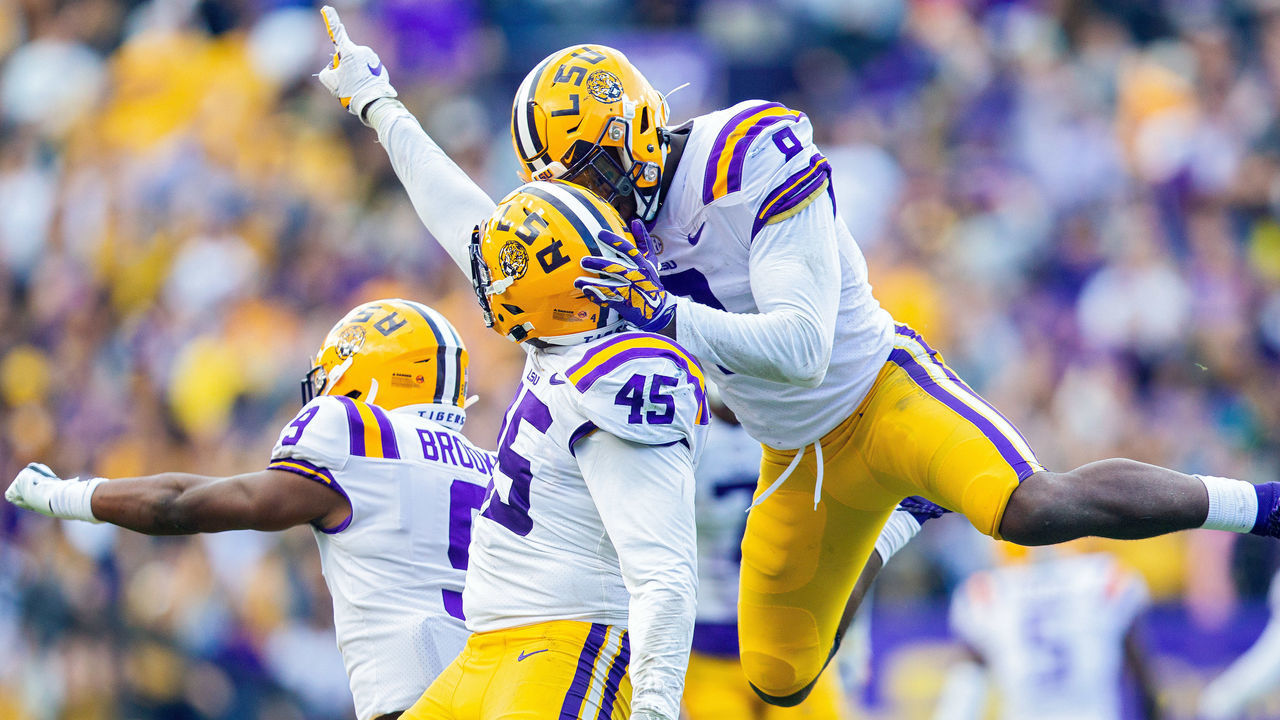 BATON ROUGE, LA - OCTOBER 26: LSU Tigers linebacker Michael Divinity Jr. (45) sacks Auburn Tigers quarterback Bo Nix (10) during a game between the LSU Tigers and the Auburn Tigers in Tiger Stadium in Baton Rouge, Louisiana on October 26, 2019.