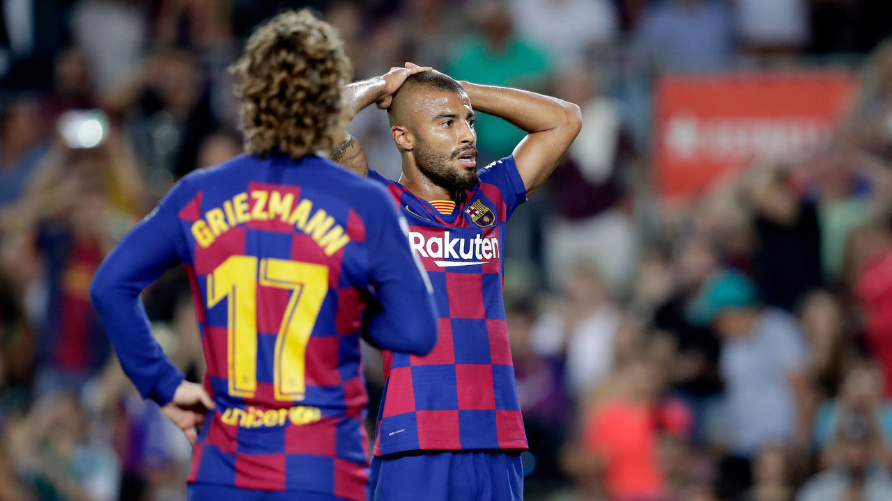 BARCELONA, SPAIN - AUGUST 25: (L-R) Griezmann of FC Barcelona, Rafinha of FC Barcelona during the La Liga Santander match between FC Barcelona v Real Betis Sevilla at the Camp Nou on August 25, 2019 in Barcelona Spain
